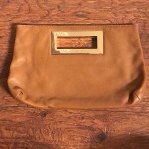 Michael Kors brown leather clutch.